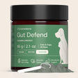 Jar of Animal Biome Gut Defend supplement for pets on a beige background
