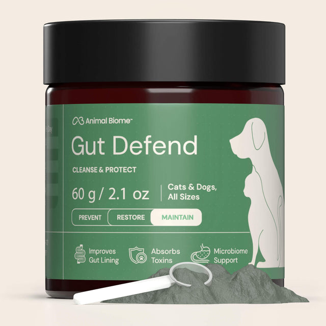 Jar of Animal Biome Gut Defend supplement for pets on a beige background