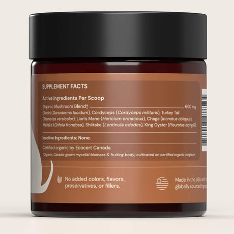 Animal Biome Mushroom Biome Blend jar with label showing supplement facts on a beige background