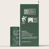 Animal Biome heavy-duty poop bags side of box with a roll on a beige background