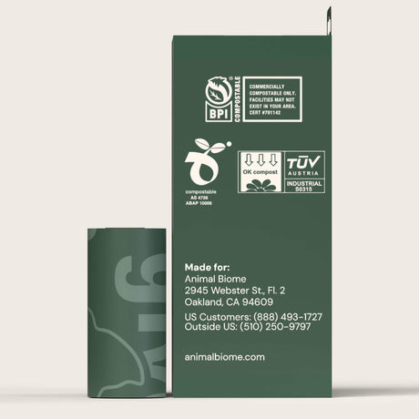 Animal Biome heavy-duty poop bags side of box with a roll on a beige background