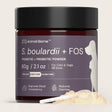 Container of Animal Biome S. boulardii + FOS powder for pets with a scoop of powder on a light background
